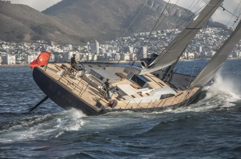 a boat with a flag on it aboard SORVIND Yacht for Charter