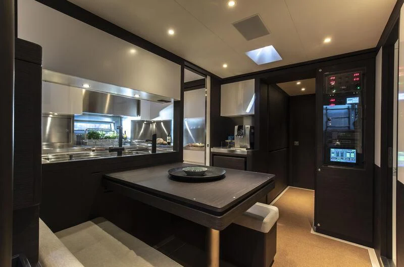 a kitchen with a counter and a sink aboard SORVIND Yacht for Charter