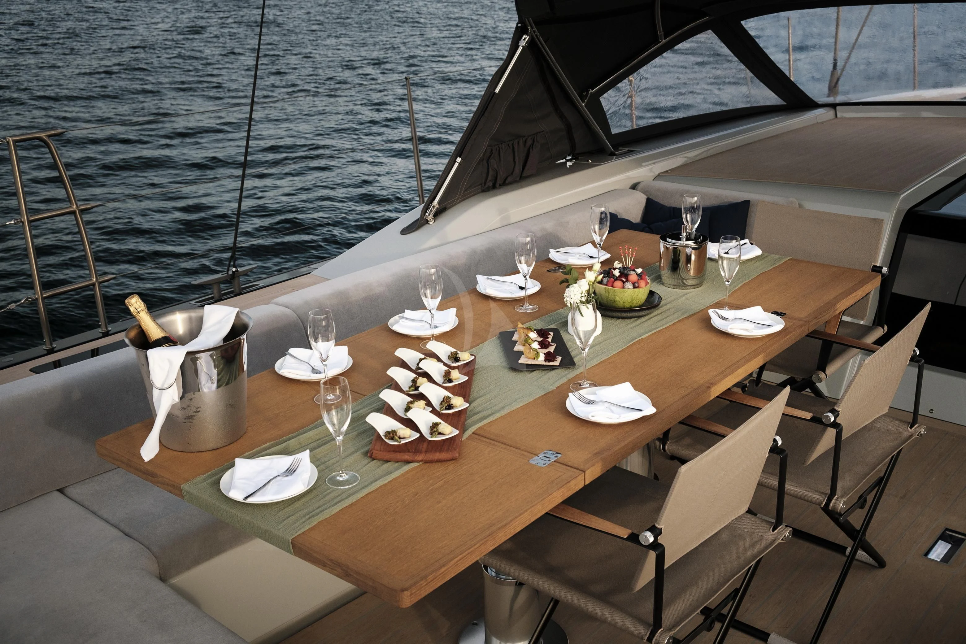 a table with food on it aboard SORVIND Yacht for Charter