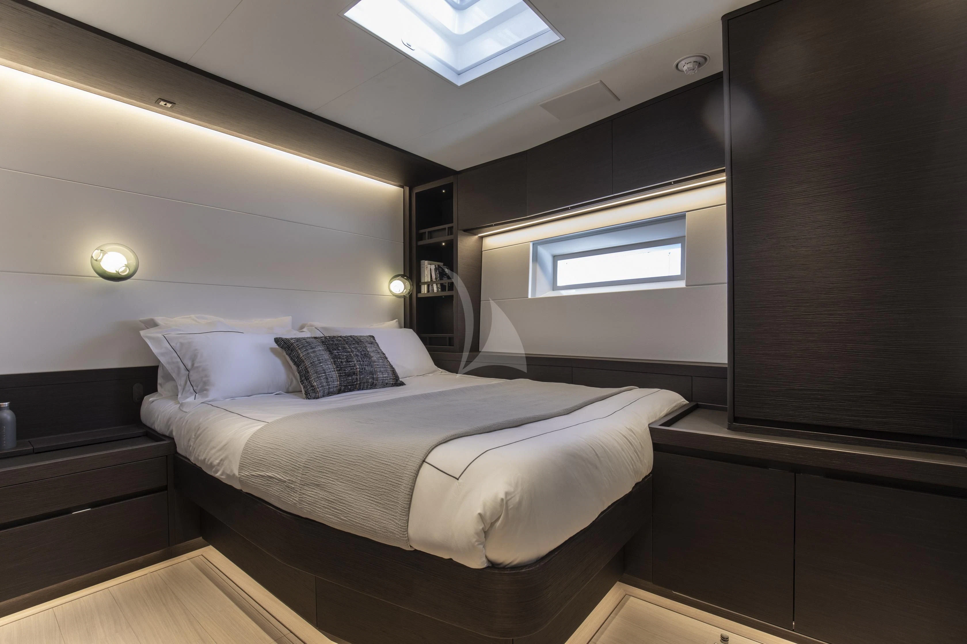 a bedroom with a bed aboard SORVIND Yacht for Charter