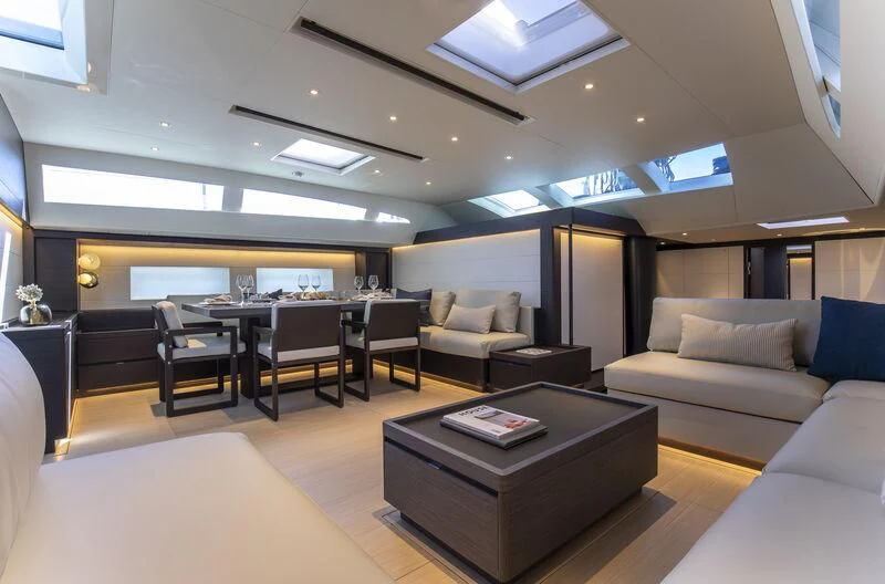 a living room with a couch and a coffee table aboard SORVIND Yacht for Charter