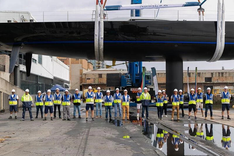 a group of people wearing matching outfits aboard SORVIND Yacht for Charter