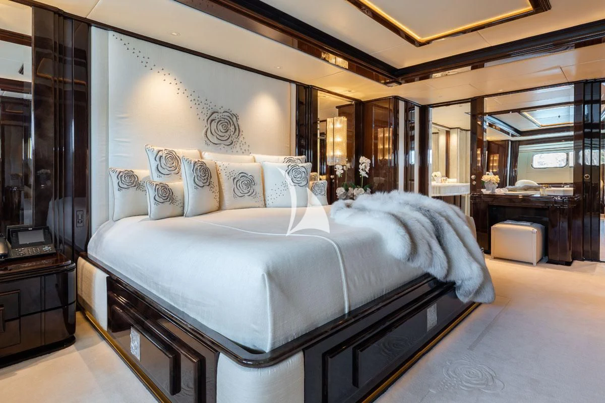 a bed in a room aboard ILLUSION V Yacht for Charter