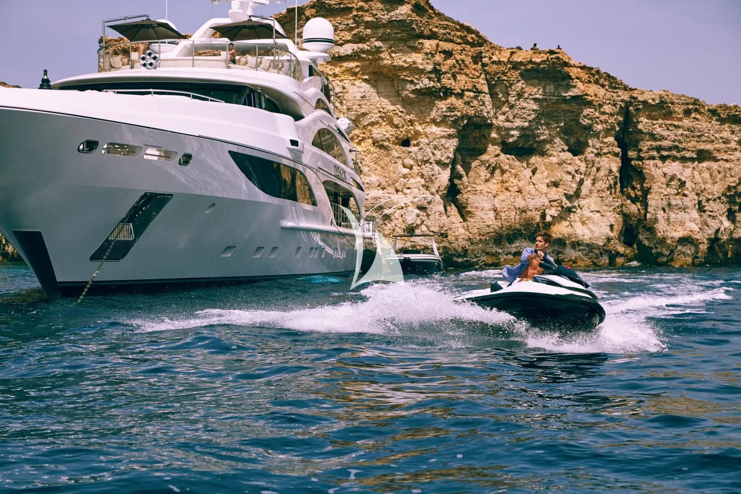 a couple of people on a boat aboard ILLUSION V Yacht for Charter