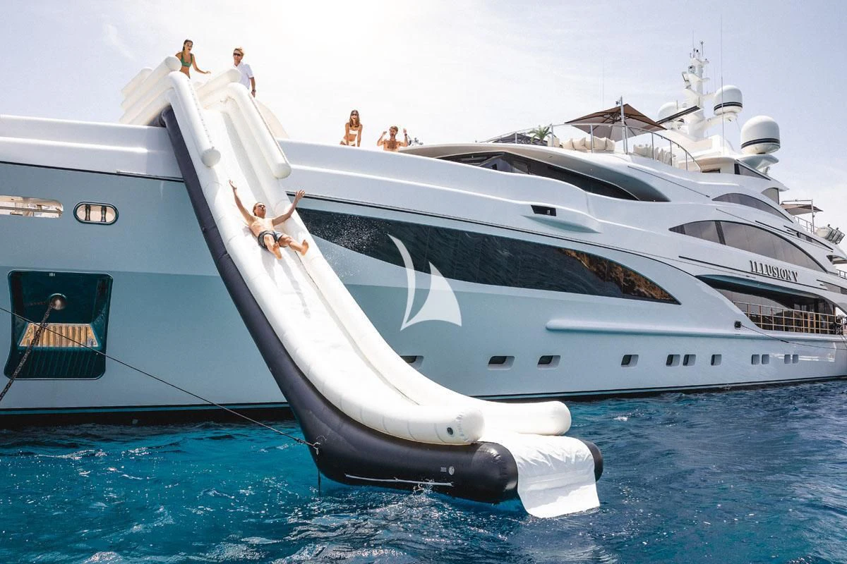 a couple of white yachts aboard ILLUSION V Yacht for Charter