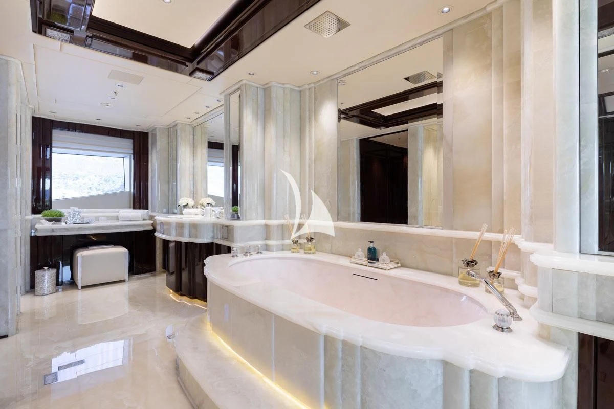 a large bathroom with a large bathtub aboard ILLUSION V Yacht for Charter