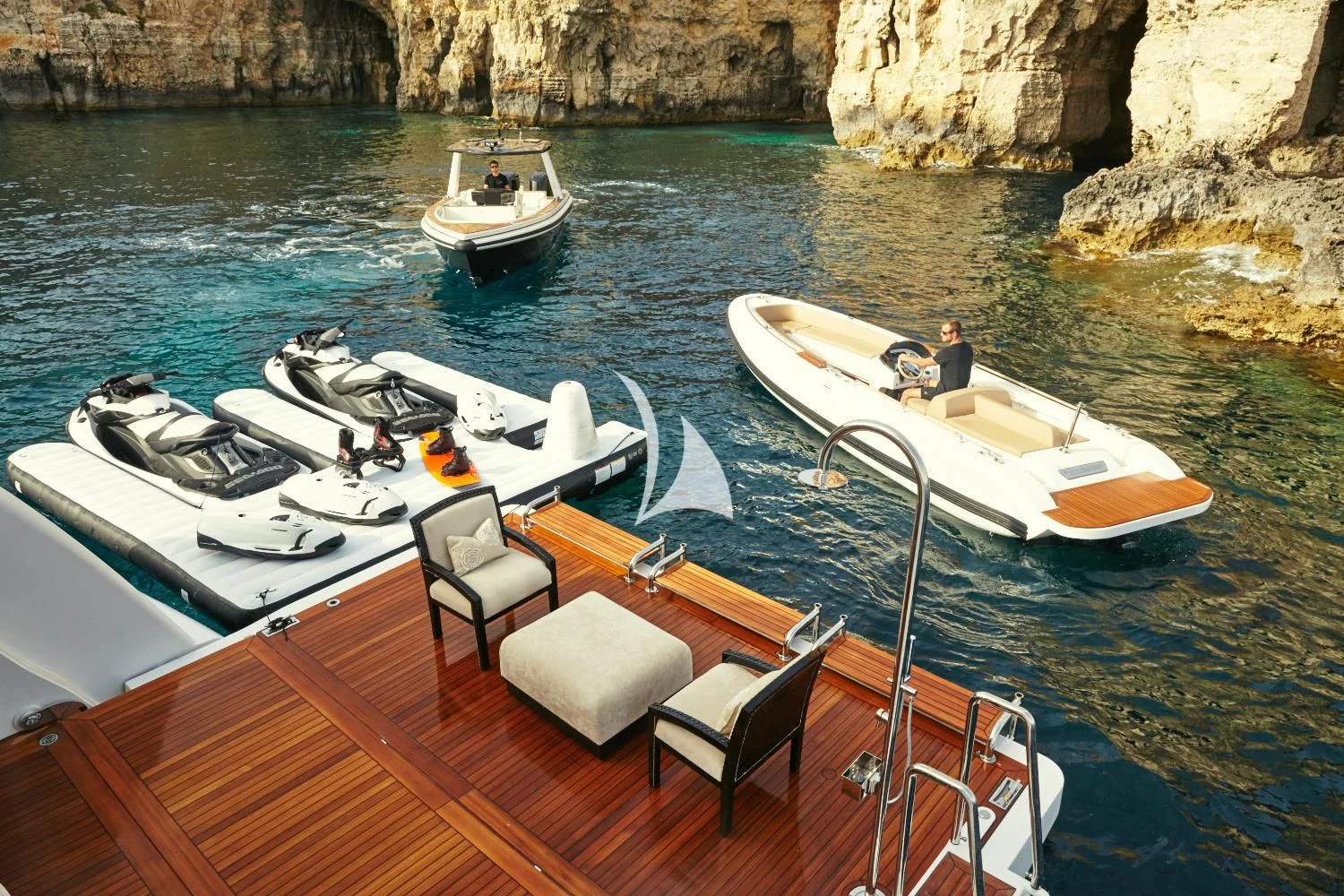 a boat with a motor on it aboard ILLUSION V Yacht for Charter