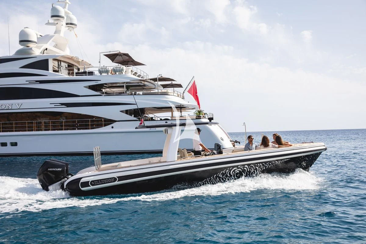 a couple of boats in the water aboard ILLUSION V Yacht for Charter