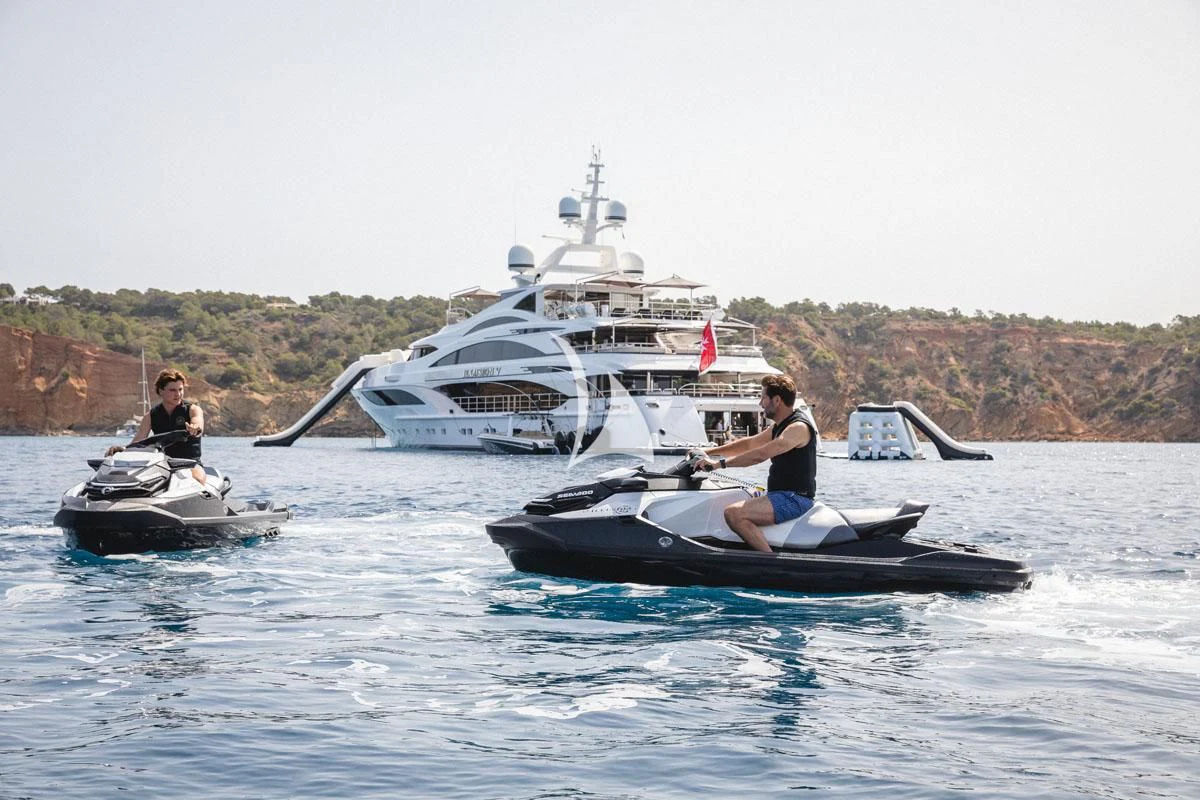 a group of people on a boat aboard ILLUSION V Yacht for Charter