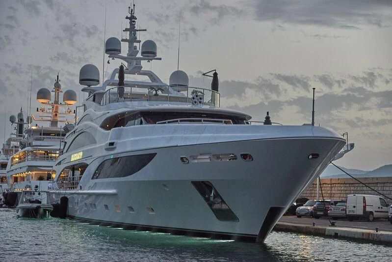 a large ship docked aboard ILLUSION V Yacht for Charter