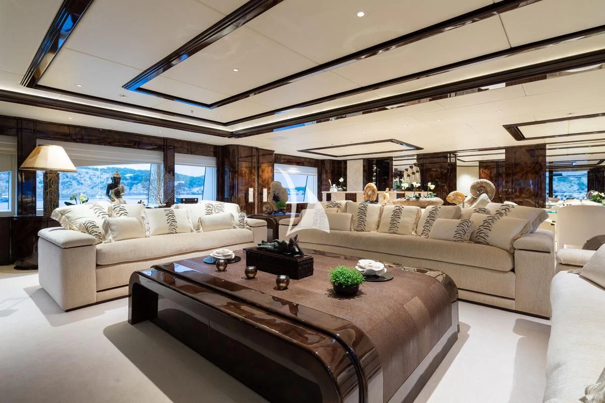 a living room with a large window aboard ILLUSION V Yacht for Charter