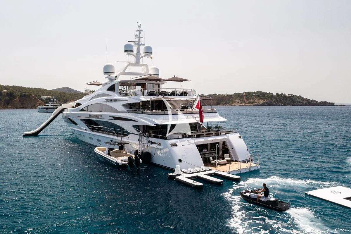 a large ship in the water aboard ILLUSION V Yacht for Charter