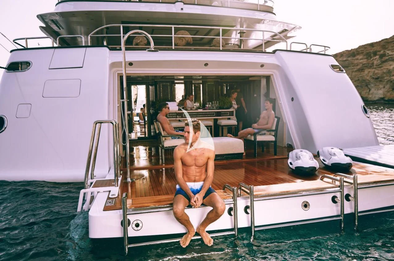 a group of people on a boat aboard ILLUSION V Yacht for Charter