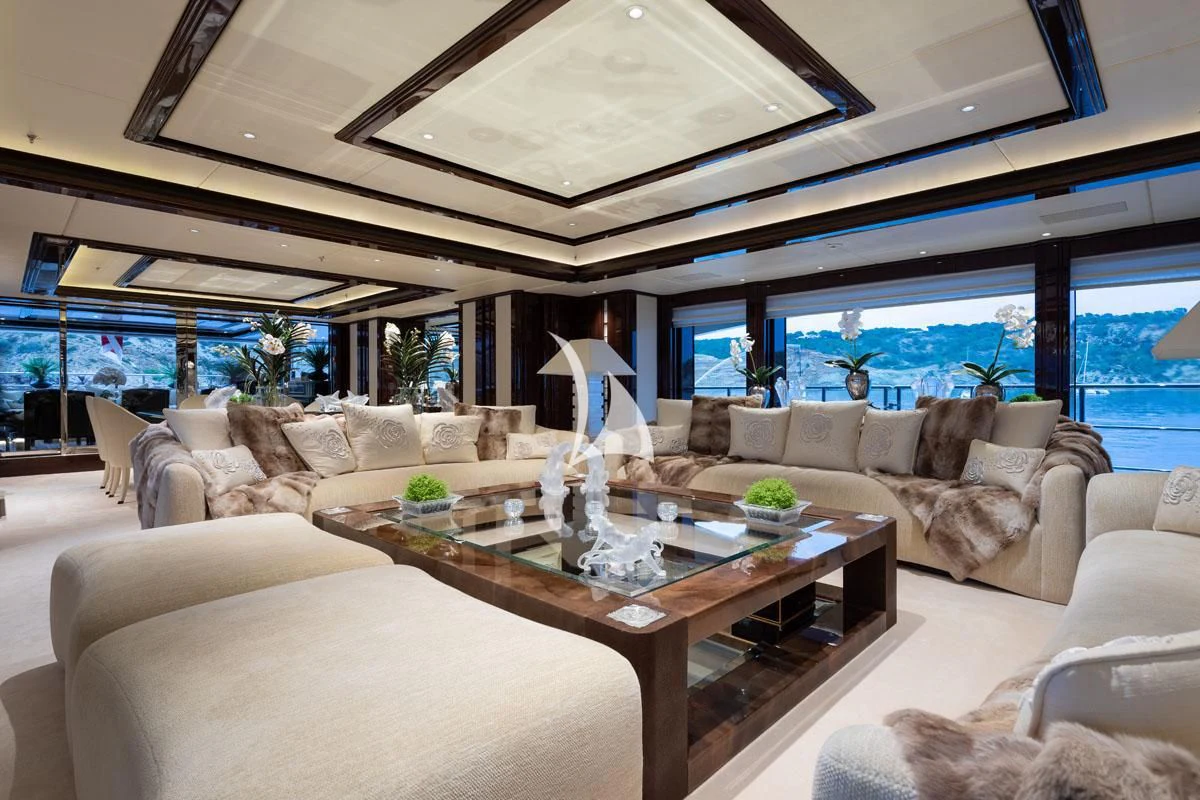 a living room with a large window aboard ILLUSION V Yacht for Charter