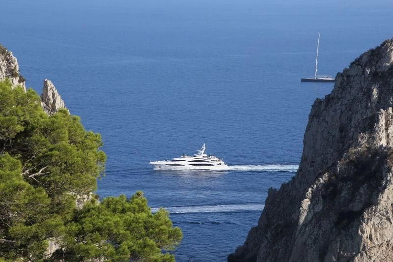 a boat sailing on the sea aboard ILLUSION V Yacht for Charter