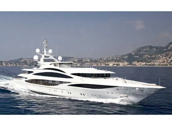 a white yacht in the water aboard ILLUSION V Yacht for Charter