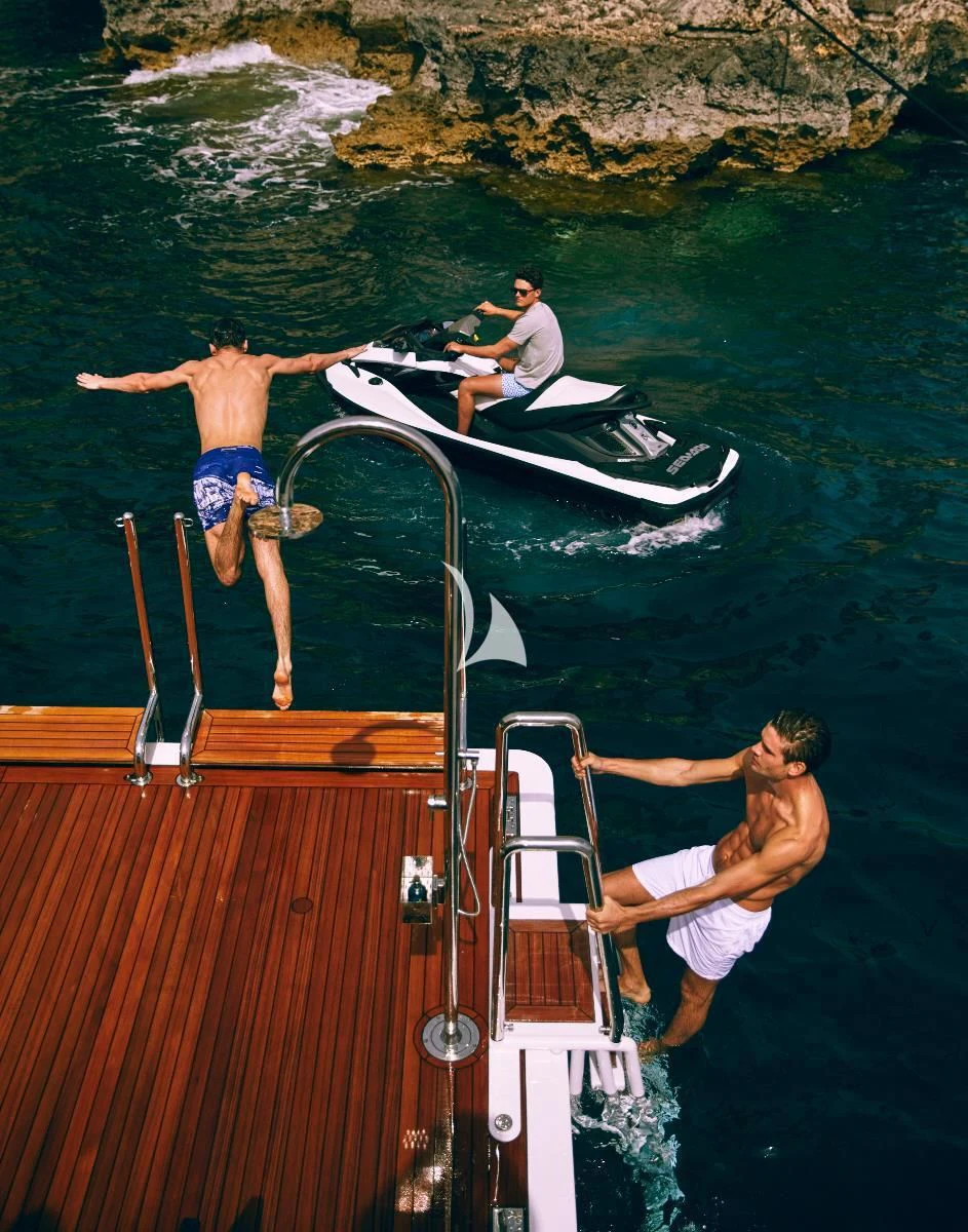 a group of people in a boat aboard ILLUSION V Yacht for Charter