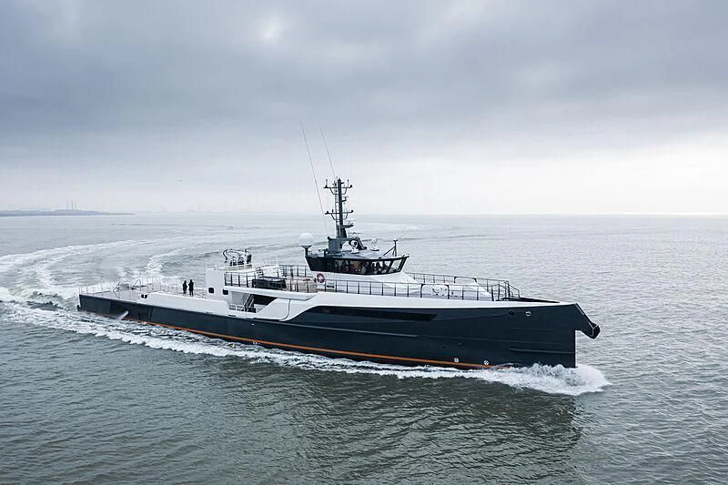 a large ship in the water aboard GENE CHASER Yacht for Sale