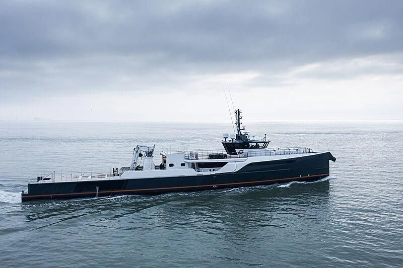 a large ship in the water aboard GENE CHASER Yacht for Sale