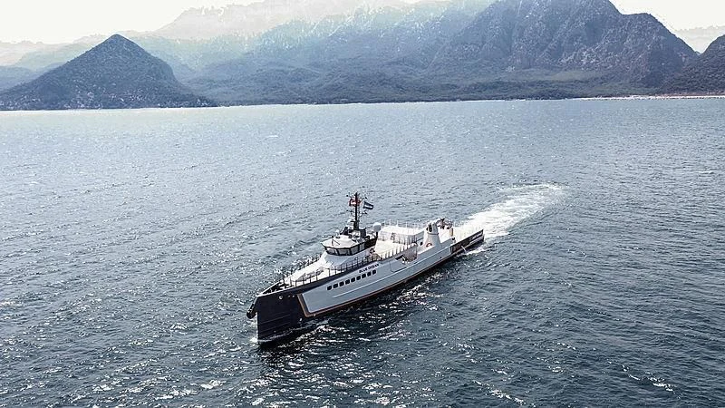 a large ship in the water aboard GENE CHASER Yacht for Sale
