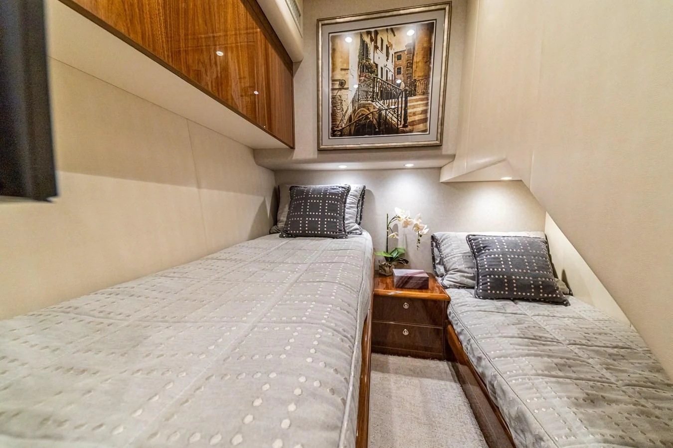 a couple of beds in a hotel room aboard MANA Yacht for Sale