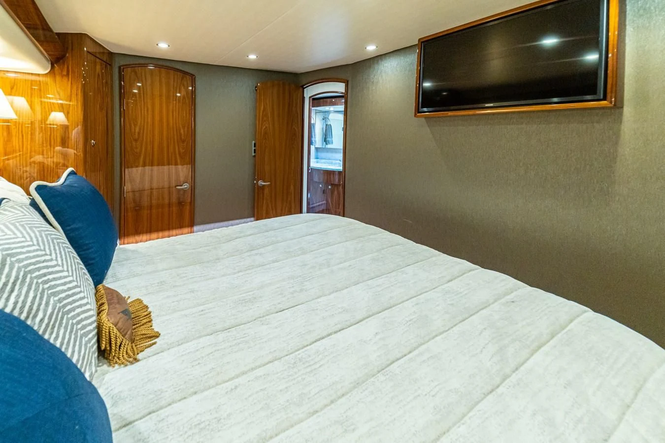 a bed in a hotel room aboard MANA Yacht for Sale