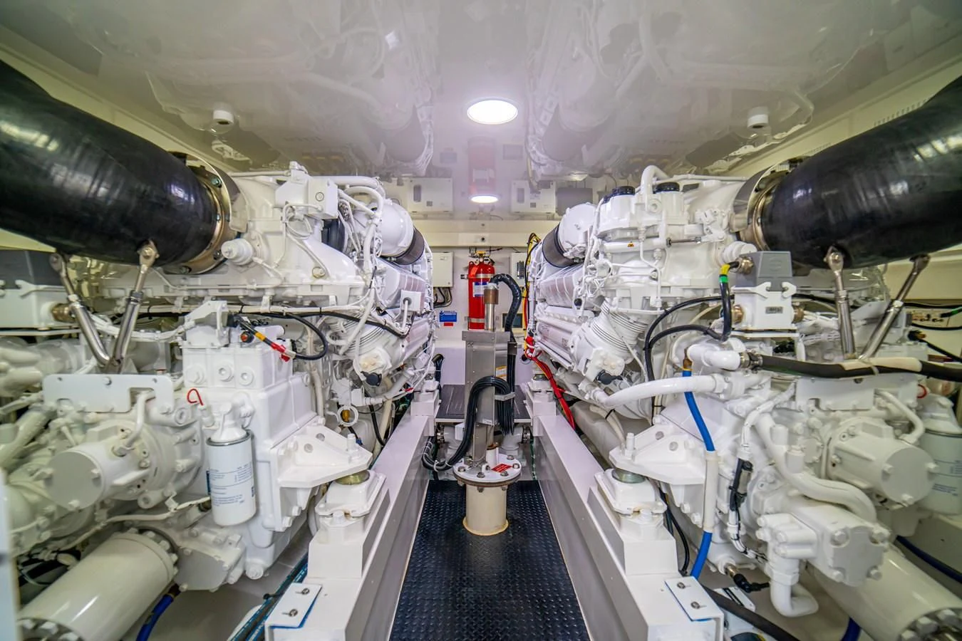 a large white machine aboard MANA Yacht for Sale