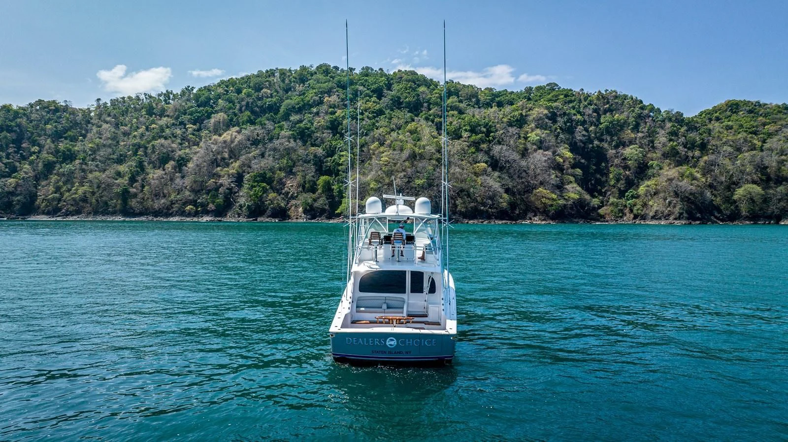 a boat sailing in the water aboard MANA Yacht for Sale