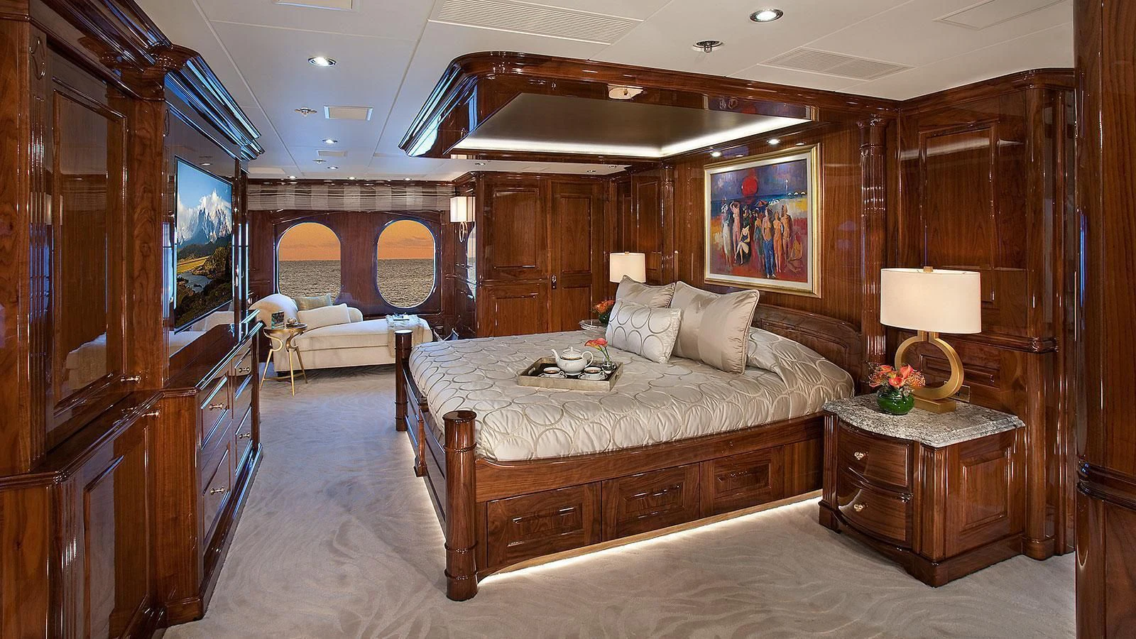 a bedroom with a bed and a mirror aboard D'NATALIN IV Yacht for Sale