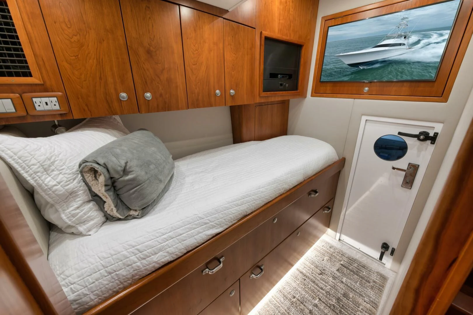 a bed in a room aboard LET  RIDE Yacht for Sale