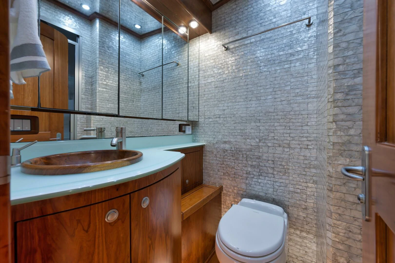 a bathroom with a sink and a toilet aboard LET  RIDE Yacht for Sale