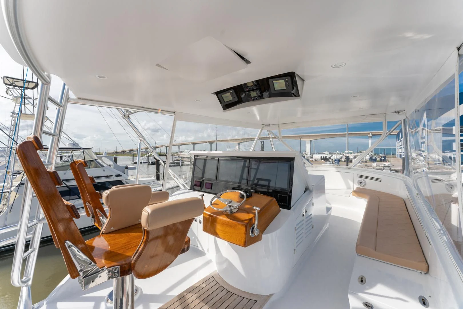 a boat with a large window aboard LET  RIDE Yacht for Sale