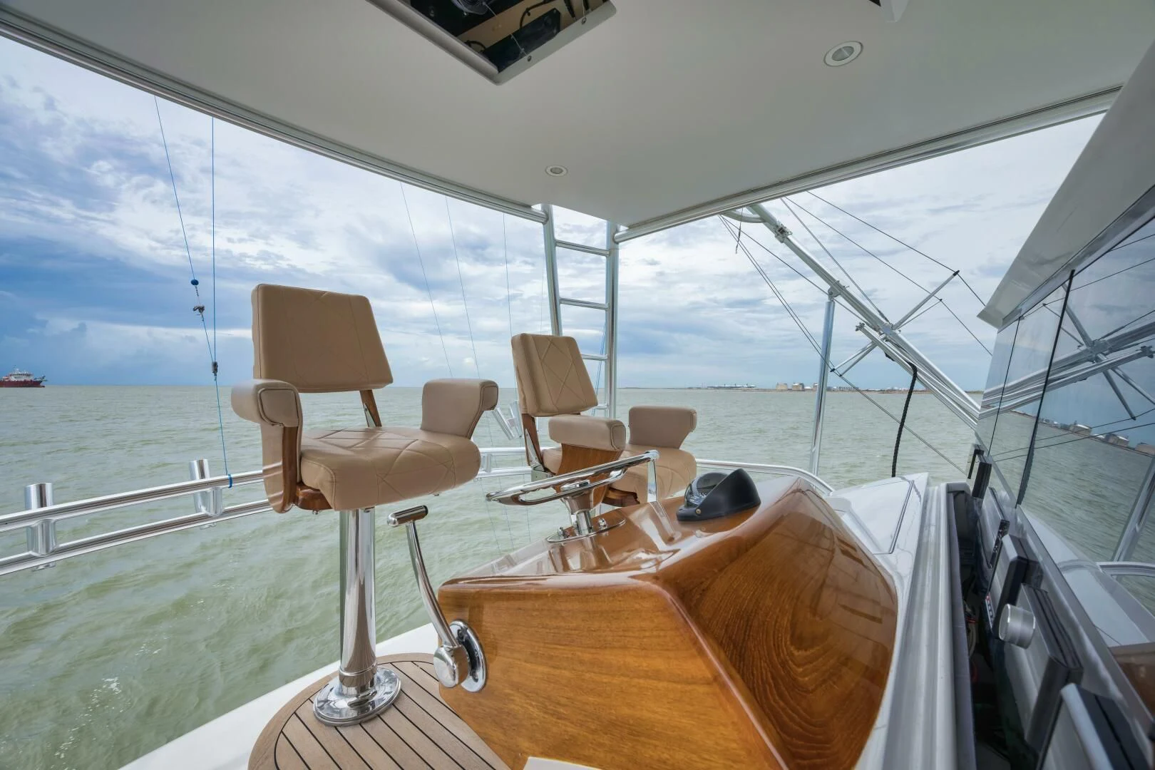 a boat with chairs and tables on it aboard LET  RIDE Yacht for Sale