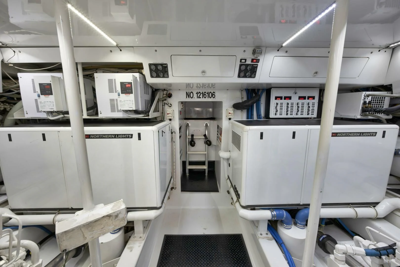 a room with white machines aboard LET  RIDE Yacht for Sale