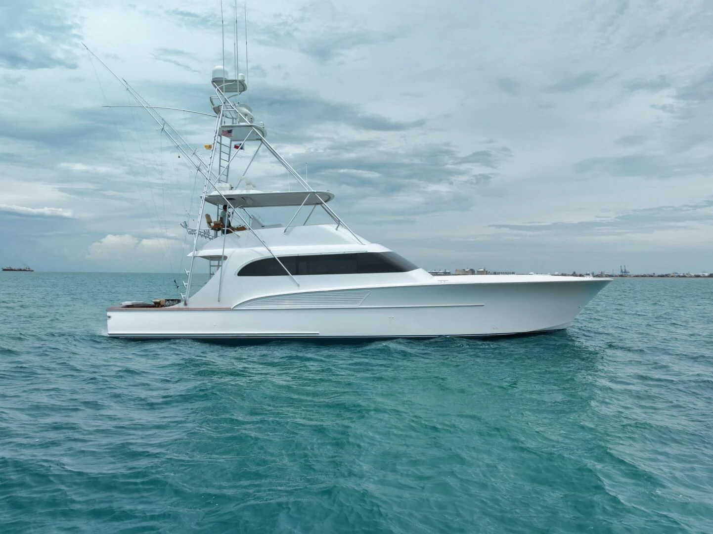 a white yacht in the water aboard LET  RIDE Yacht for Sale