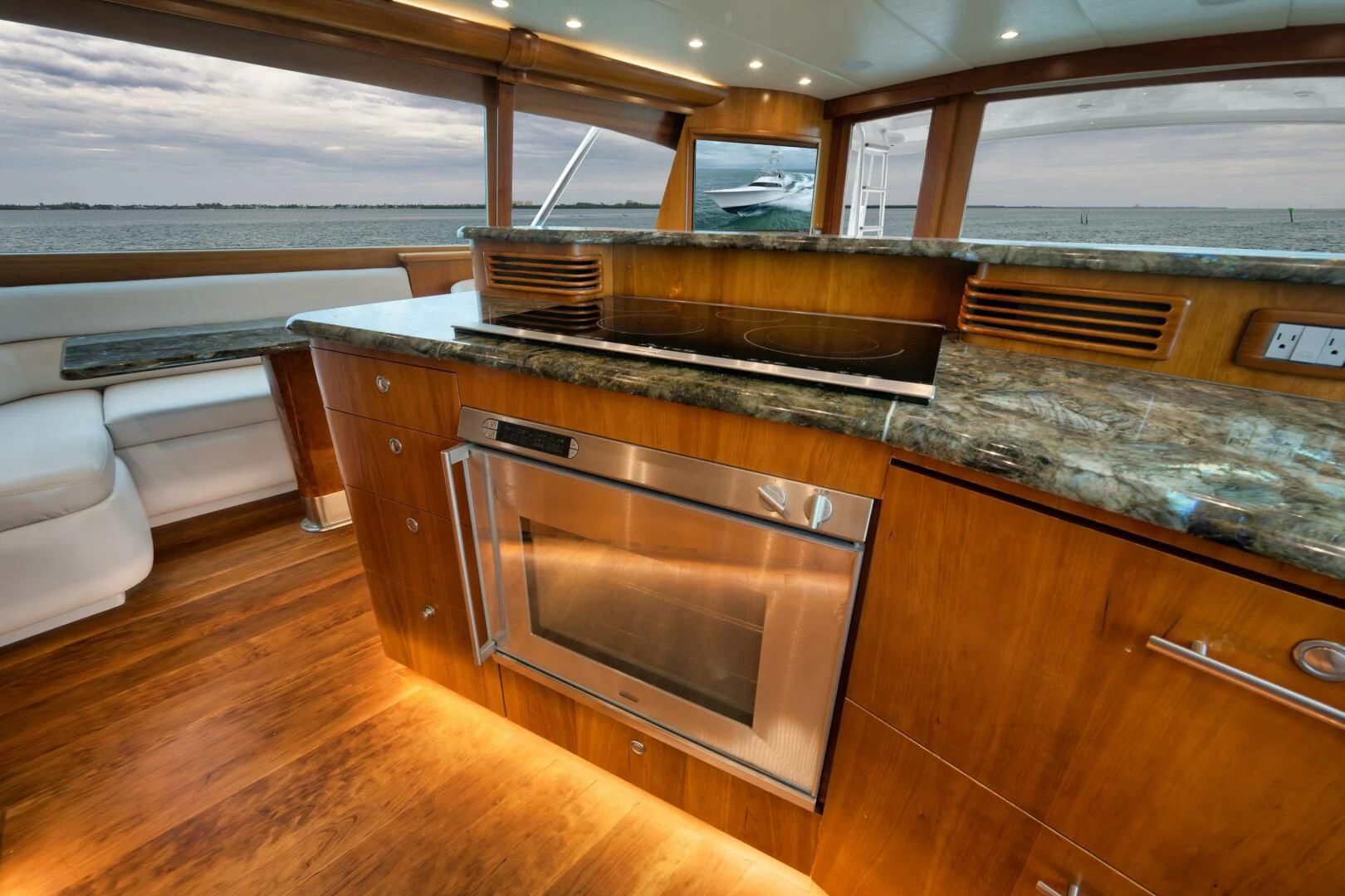 a kitchen with a stove and oven aboard LET  RIDE Yacht for Sale