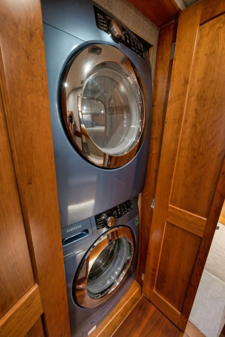 a washing machine in a room aboard LET  RIDE Yacht for Sale