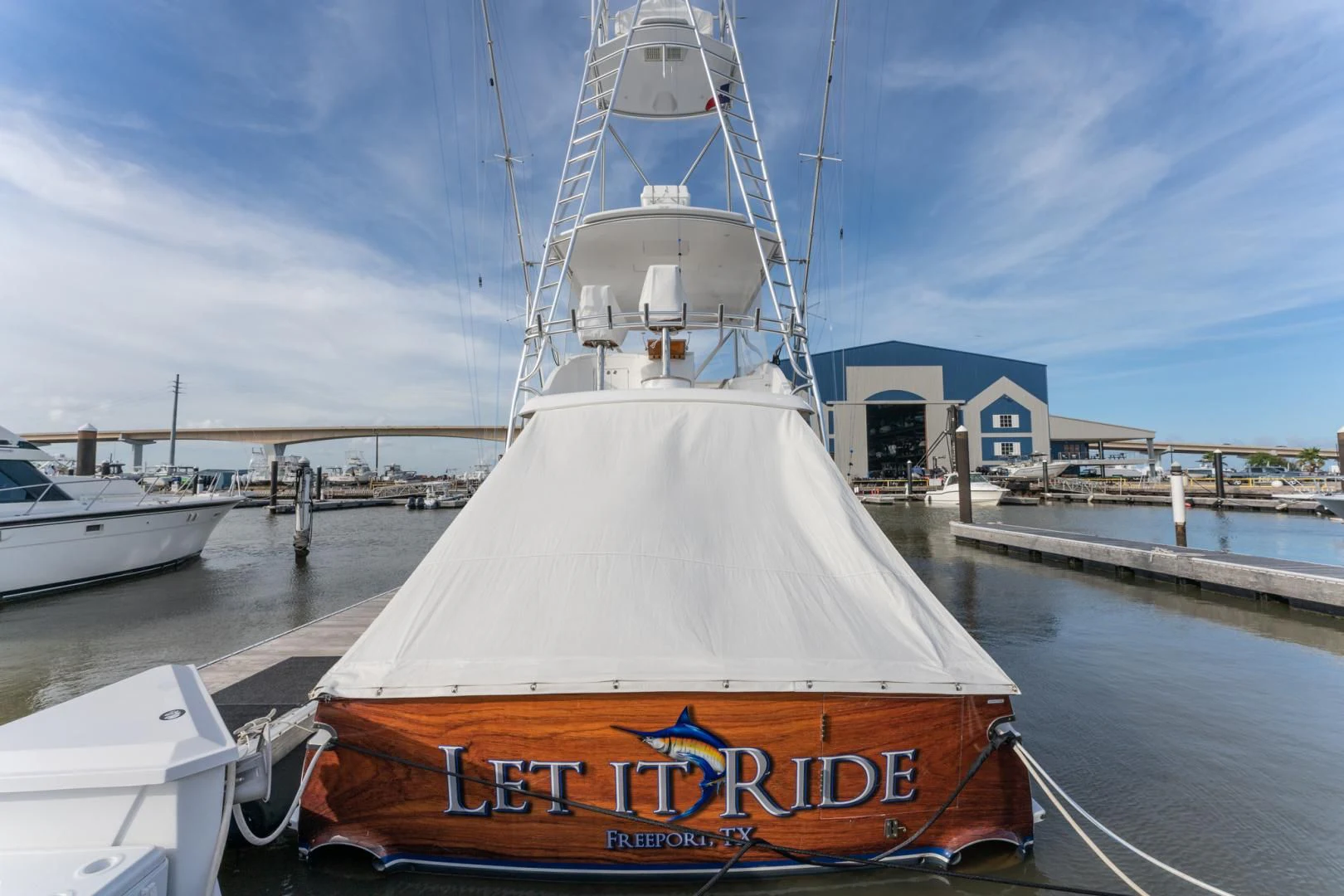 a large white boat aboard LET  RIDE Yacht for Sale