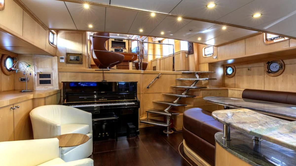 a kitchen with a bar and a grill aboard DE VROUWE CHRISTINA Yacht for Sale