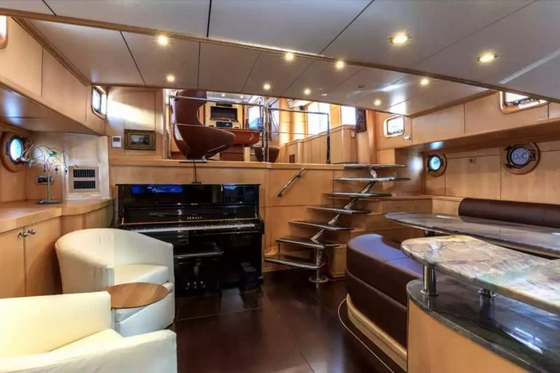 a kitchen with a bar and a bar aboard DE VROUWE CHRISTINA Yacht for Sale