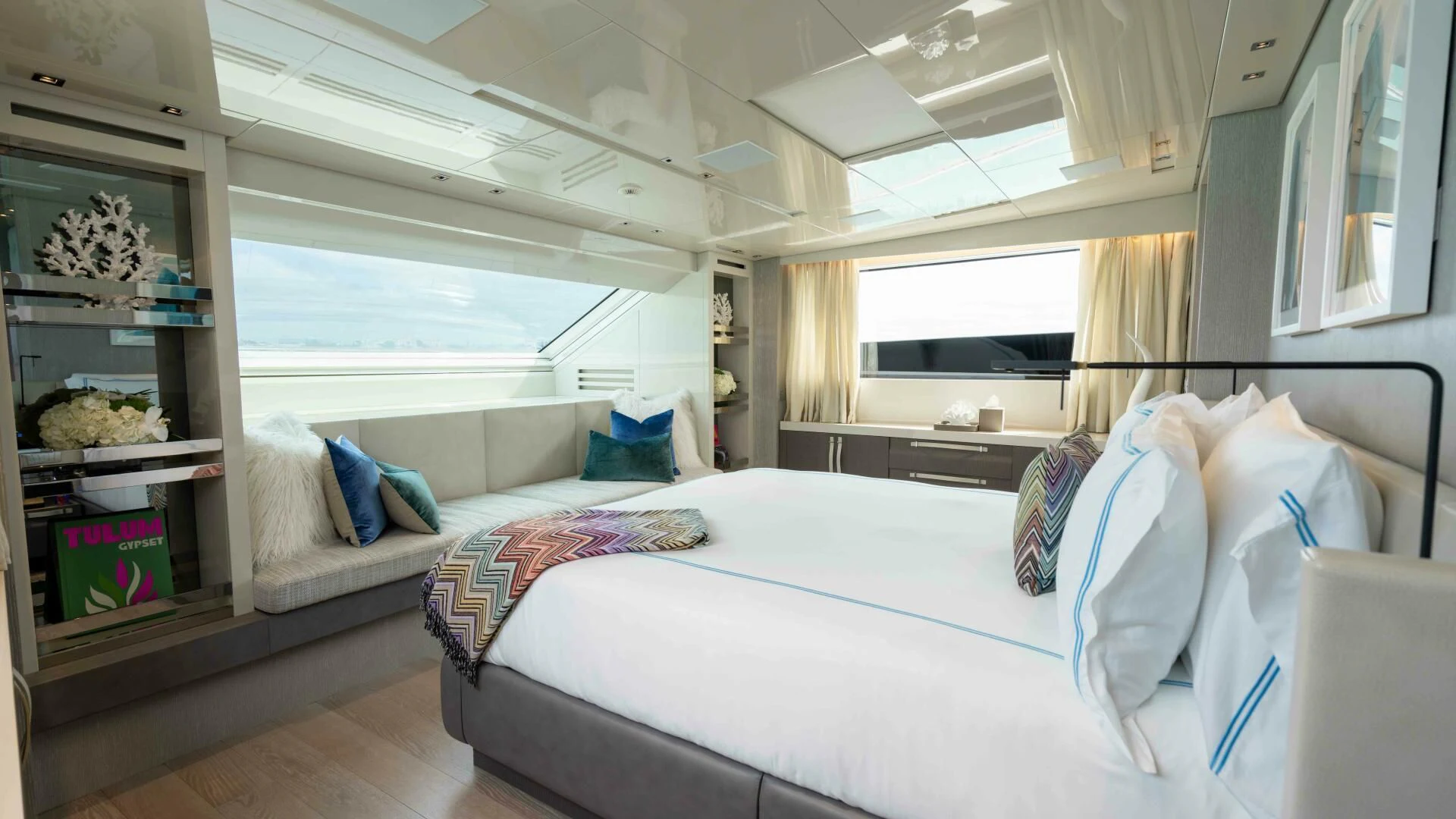 a room with a bed and a window aboard TIME OUT I Yacht for Sale