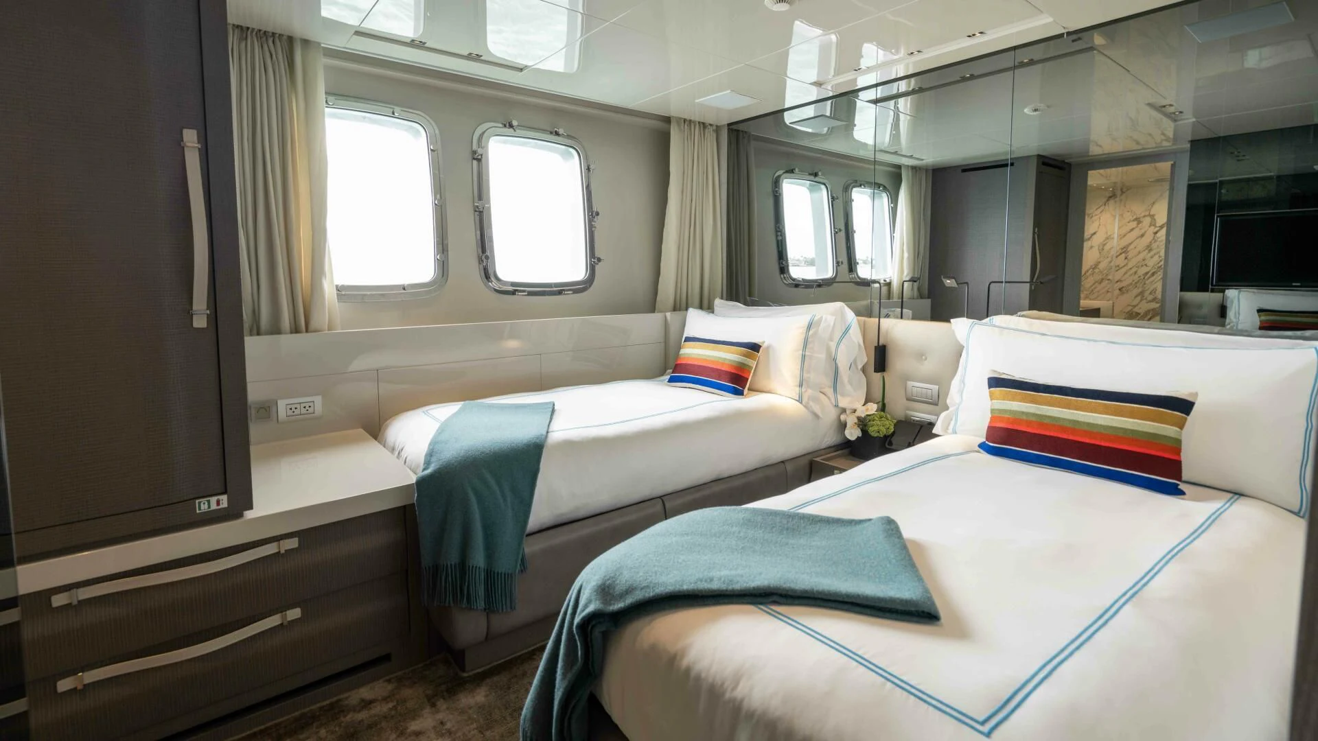 a room with two beds aboard TIME OUT I Yacht for Sale