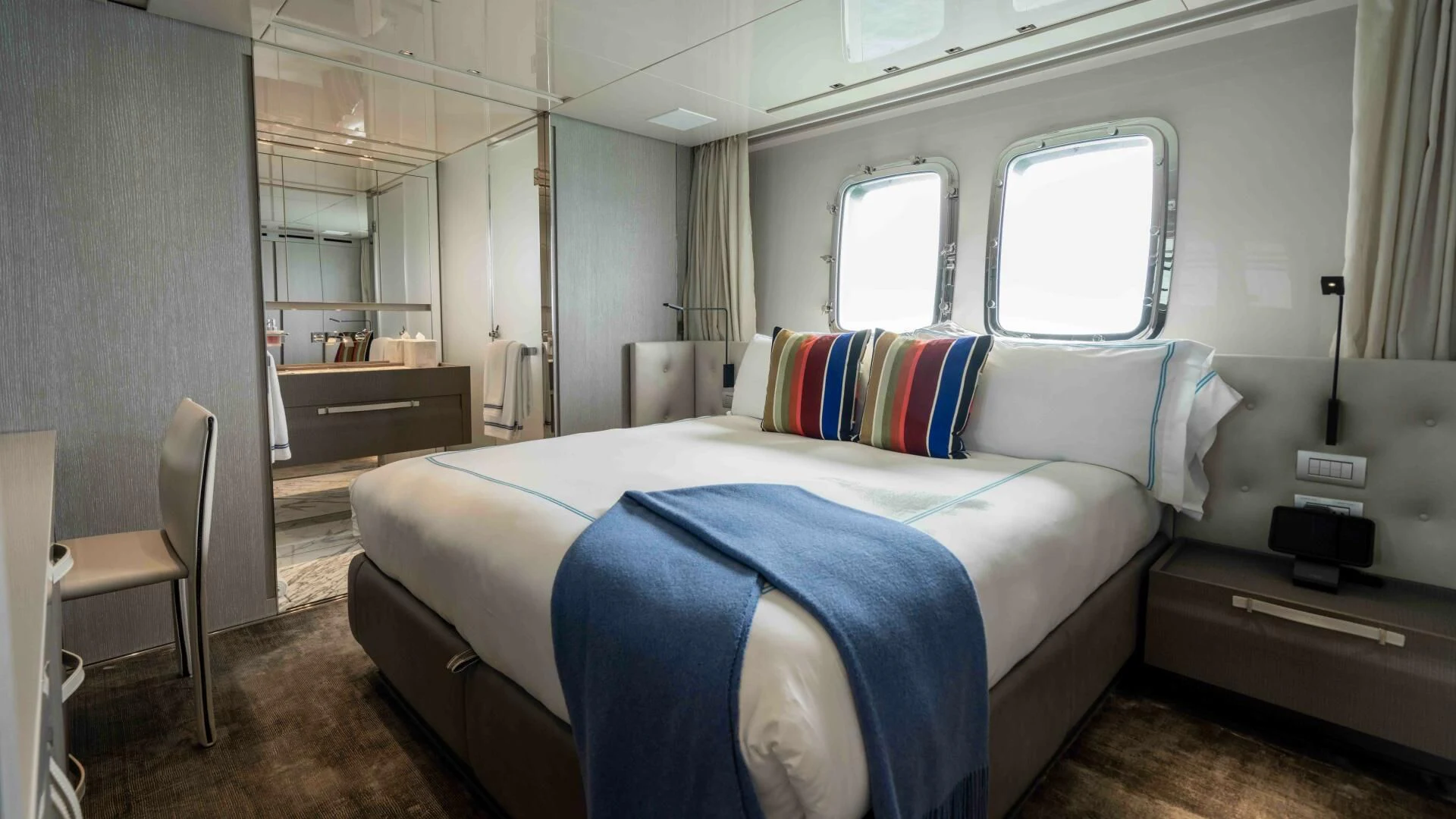 a bed in a room aboard TIME OUT I Yacht for Sale