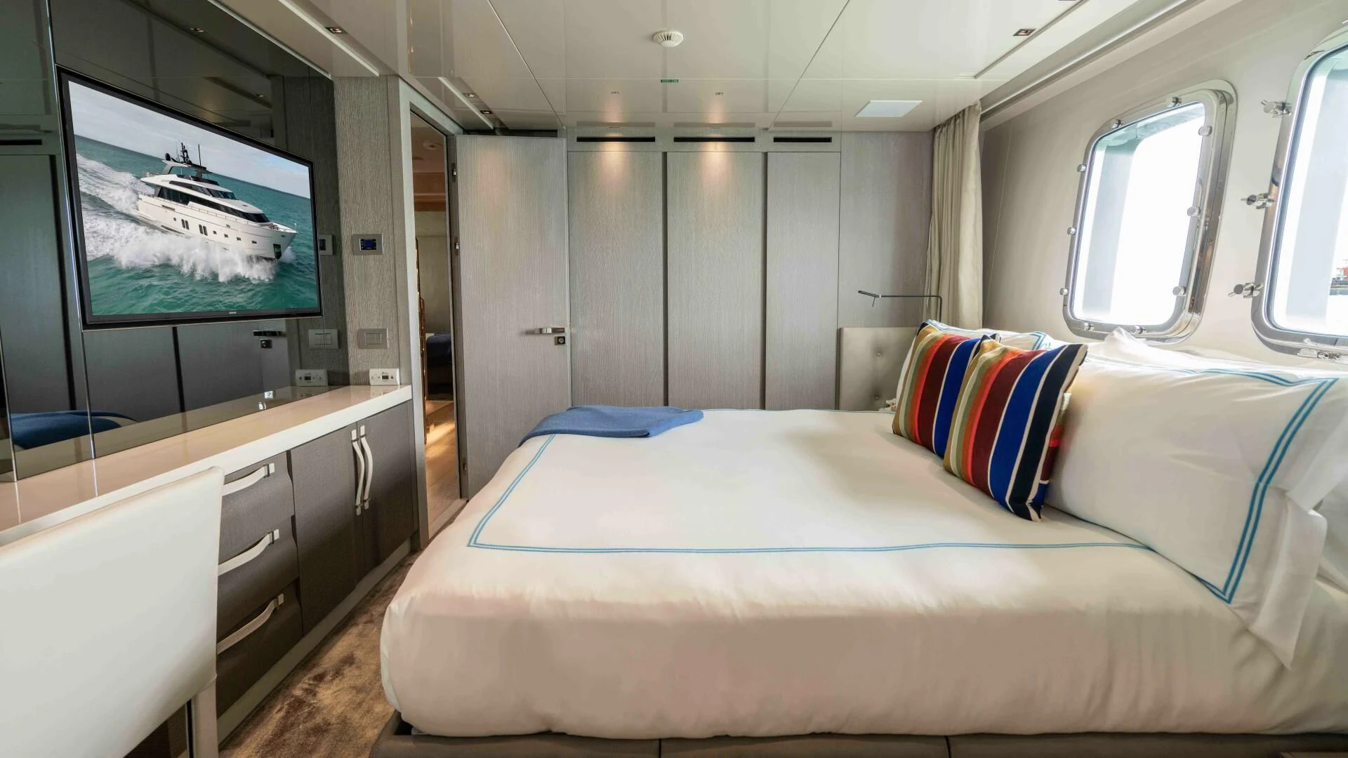 a bed in a room aboard TIME OUT I Yacht for Sale
