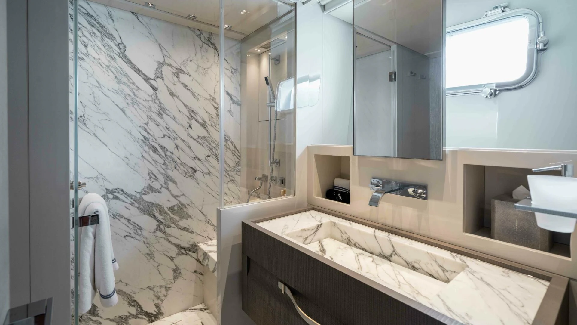 a bathroom with a large mirror aboard TIME OUT I Yacht for Sale