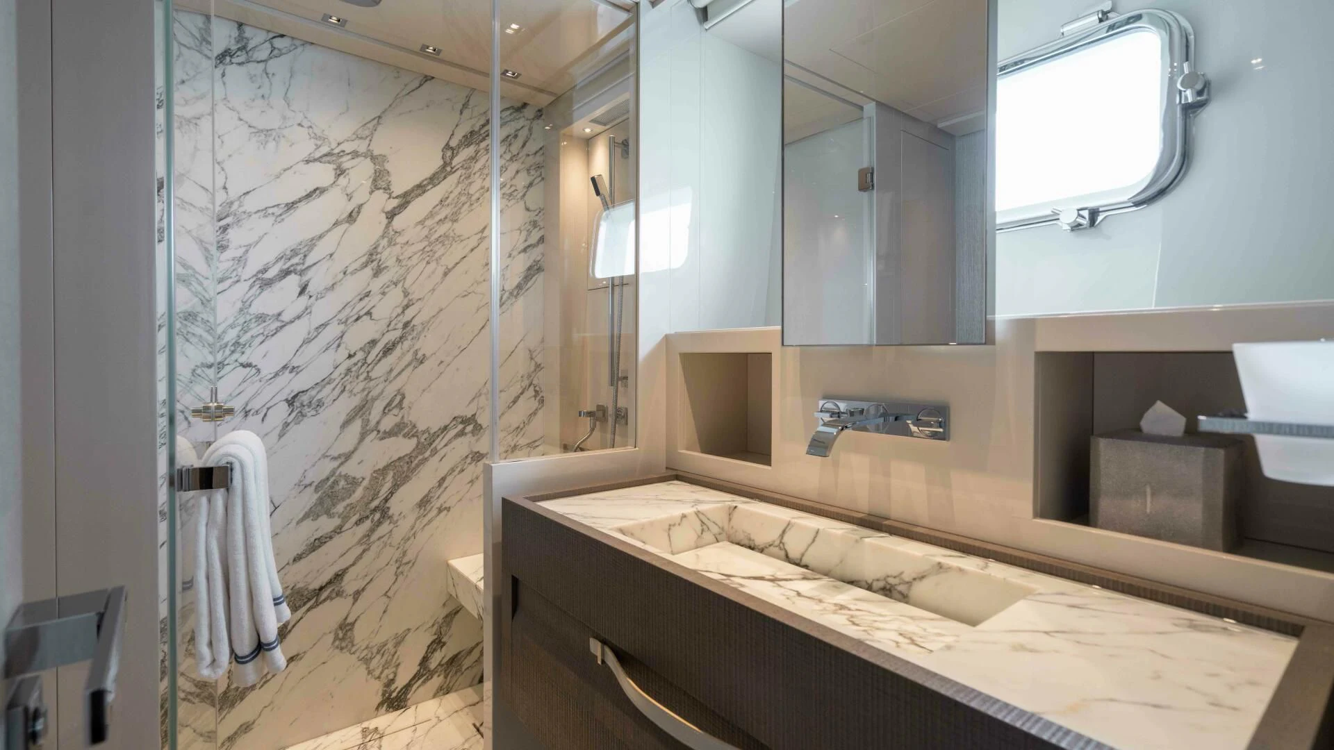 a bathroom with a large mirror aboard TIME OUT I Yacht for Sale