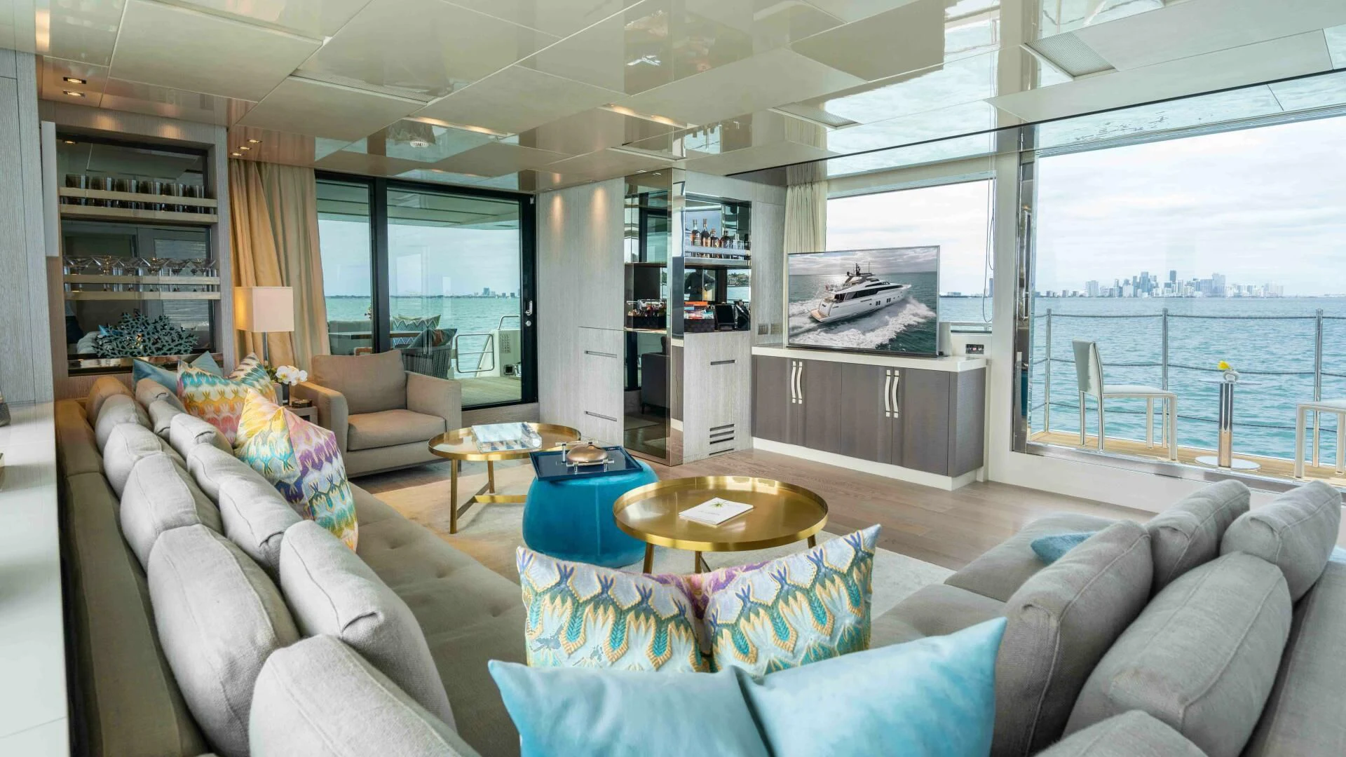 a living room with a large window aboard TIME OUT I Yacht for Sale