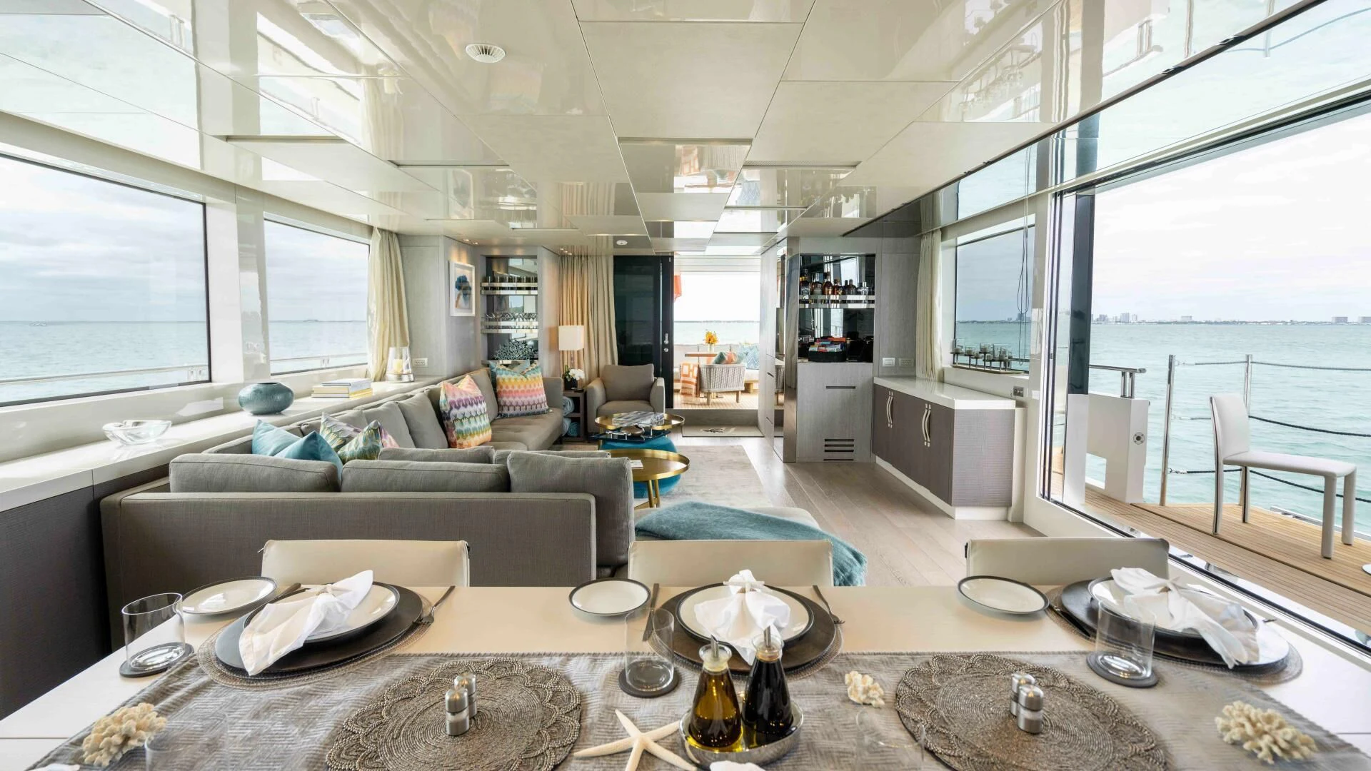 a living room with a couch and a table aboard TIME OUT I Yacht for Sale