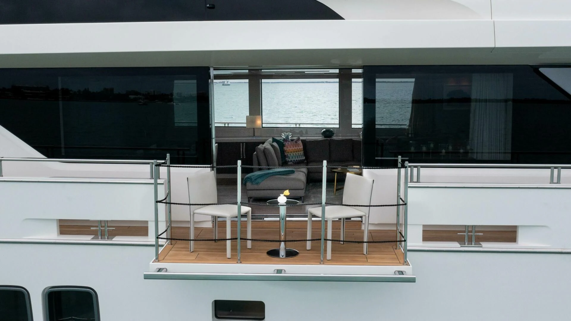 a room with chairs and a table aboard TIME OUT I Yacht for Sale