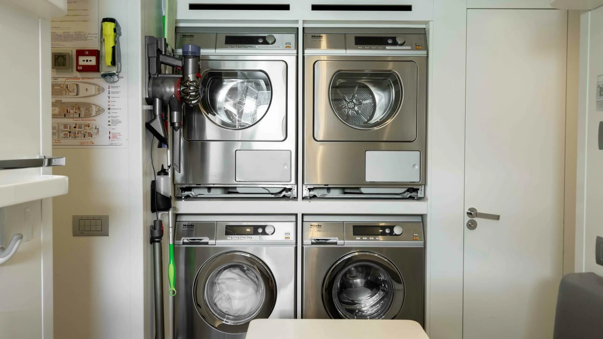 a row of washing machines aboard TIME OUT I Yacht for Sale